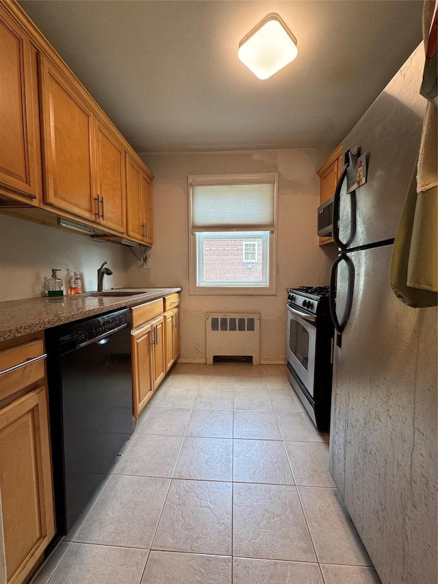 7827 Cloverdale Blvd Unit A, Oakland Gardens, NY 11364 - kitchen featuring stainless steel appliances, radiator heating unit, brown cabinets, light tile patterned flooring, and light stone counters
