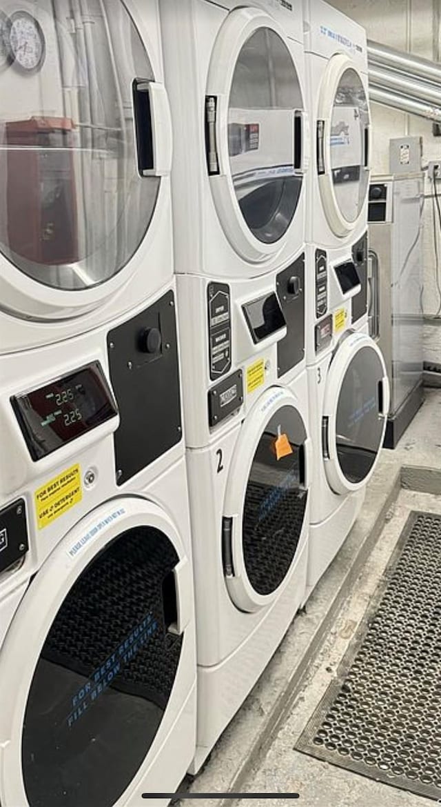12325 82nd Ave Unit 2T, Kew Gardens, NY 11415 - shared laundry room with stacked washer / drying machine