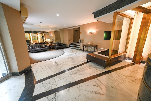 84-01 Main St Unit 410, Briarwood, NY 11435 - common area with stairs, recessed lighting, and a security system