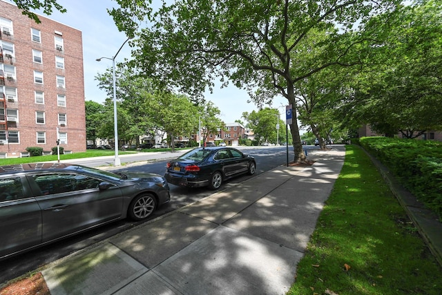 84-01 Main St Unit 410, Briarwood, NY 11435 - view of road with sidewalks and street lights