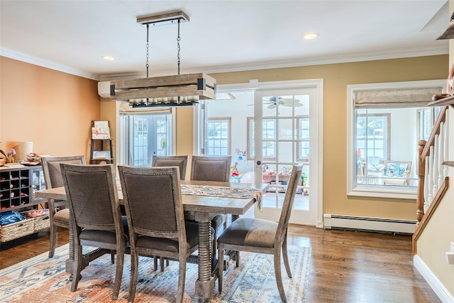 59 Acre Ln, Hicksville, NY 11801 - dining area featuring baseboard heating, ornamental molding, wood finished floors, recessed lighting, and stairs