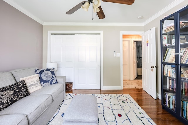 59 Acre Ln, Hicksville, NY 11801 - living area with ornamental molding, a ceiling fan, and wood finished floors