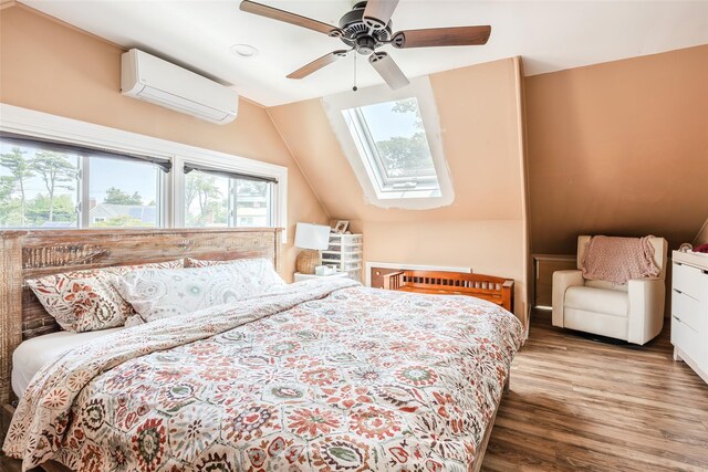 59 Acre Ln, Hicksville, NY 11801 - bedroom with a wall unit AC, wood finished floors, a skylight, and ceiling fan