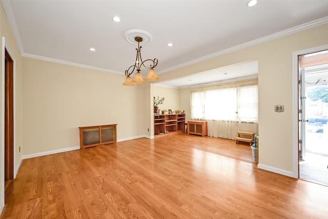 92-05 218th Pl, Queens Village, NY 11428 - unfurnished living room featuring light wood-style floors, ornamental molding, recessed lighting, and a chandelier