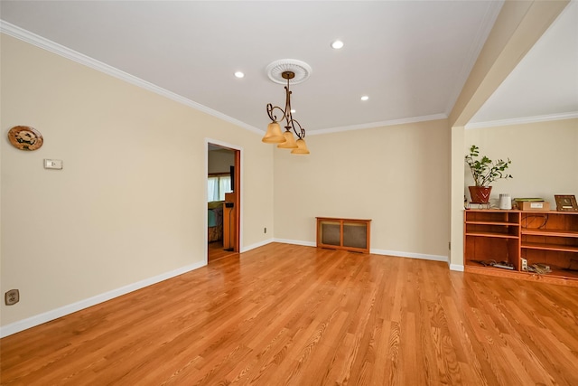 92-05 218th Pl, Queens Village, NY 11428 - empty room featuring light wood-type flooring, a chandelier, crown molding, and recessed lighting