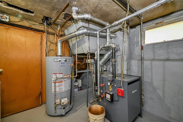 92-05 218th Pl, Queens Village, NY 11428 - utilities with water heater and a heating unit