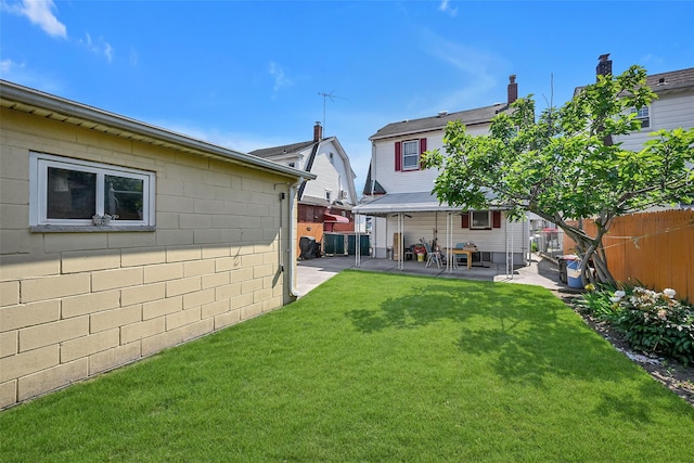 92-05 218th Pl, Queens Village, NY 11428 - fenced backyard featuring a patio