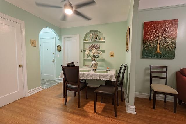 3545 81st St Unit C2, Jackson Heights, NY 11372 - dining space featuring a ceiling fan and wood finished floors