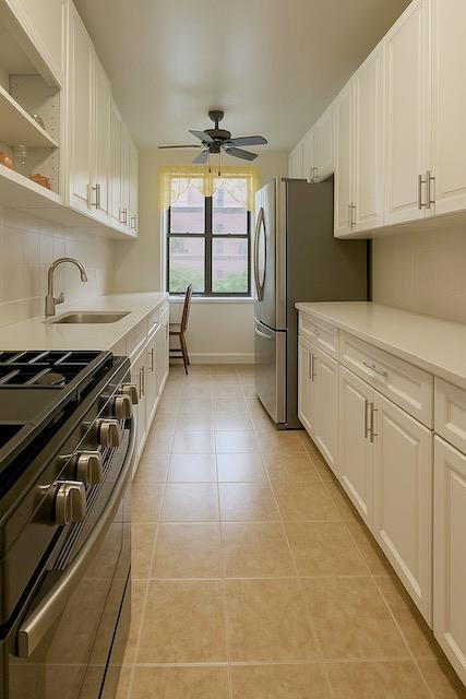 3545 81st St Unit C2, Jackson Heights, NY 11372 - kitchen featuring gas range, white cabinetry, a ceiling fan, and light countertops