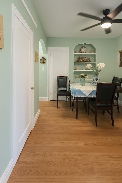 3545 81st St Unit C2, Jackson Heights, NY 11372 - dining space with a ceiling fan, light wood-style flooring, and built in features