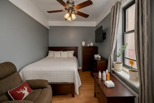 3545 81st St Unit C2, Jackson Heights, NY 11372 - bedroom featuring wood finished floors and ceiling fan