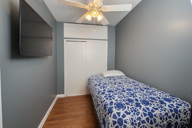 3545 81st St Unit C2, Jackson Heights, NY 11372 - bedroom featuring wood finished floors, a closet, and ceiling fan