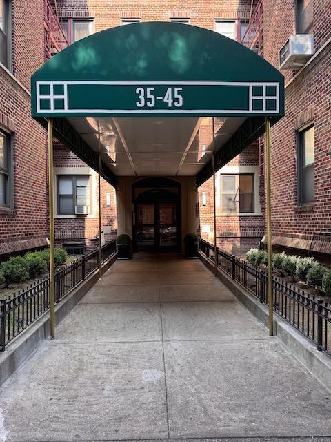3545 81st St Unit C2, Jackson Heights, NY 11372 - view of exterior entry with cooling unit