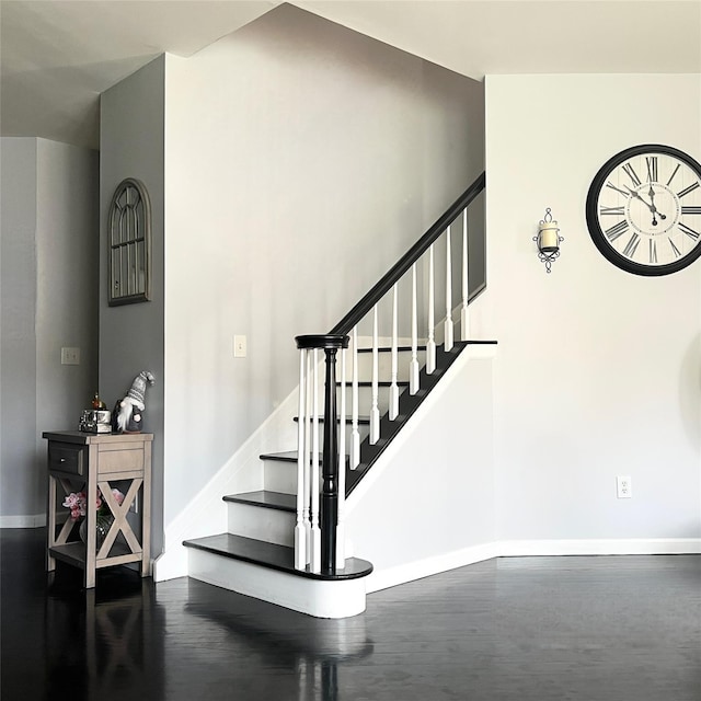 33 Sunflower Ridge Rd, South Setauket, NY 11720 - stairs featuring baseboards and wood finished floors