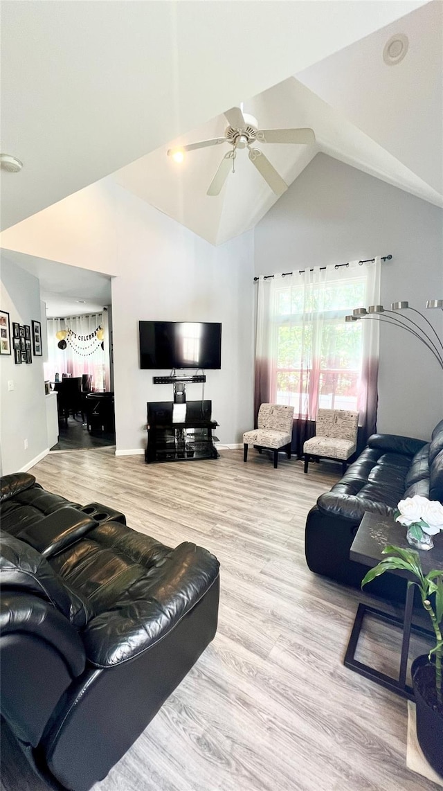 33 Sunflower Ridge Rd, South Setauket, NY 11720 - living area featuring high vaulted ceiling, wood finished floors, and a ceiling fan