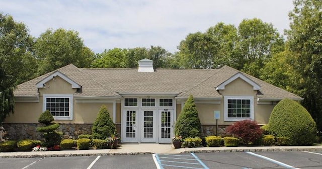 33 Sunflower Ridge Rd, South Setauket, NY 11720 - view of building exterior featuring uncovered parking
