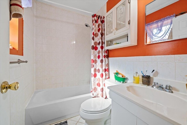 1935 Holland Ave, Bronx, NY 10462 - full bath with shower / bath combo with shower curtain, vanity, tile walls, and tile patterned flooring