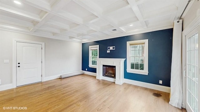 60 E Minerva Rd, Lindenhurst, NY 11757 - unfurnished living room featuring plenty of natural light, light wood-style flooring, a glass covered fireplace, beamed ceiling, and coffered ceiling