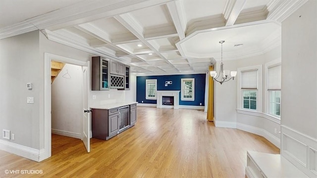 60 E Minerva Rd, Lindenhurst, NY 11757 - bar with light wood finished floors, a fireplace, beam ceiling, a chandelier, and coffered ceiling