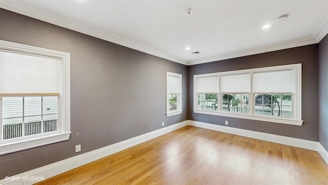 60 E Minerva Rd, Lindenhurst, NY 11757 - empty room featuring ornamental molding, a smoke detector, wood finished floors, and recessed lighting