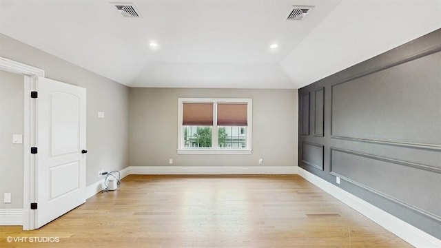 60 E Minerva Rd, Lindenhurst, NY 11757 - unfurnished room with light wood-type flooring and recessed lighting