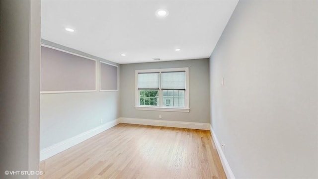 60 E Minerva Rd, Lindenhurst, NY 11757 - empty room featuring wood finished floors and recessed lighting