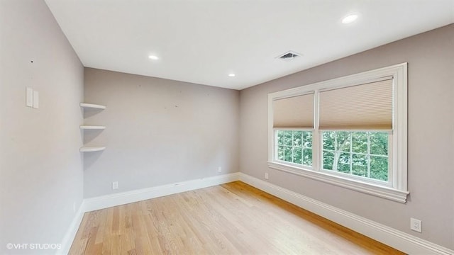 60 E Minerva Rd, Lindenhurst, NY 11757 - empty room featuring wood finished floors and recessed lighting
