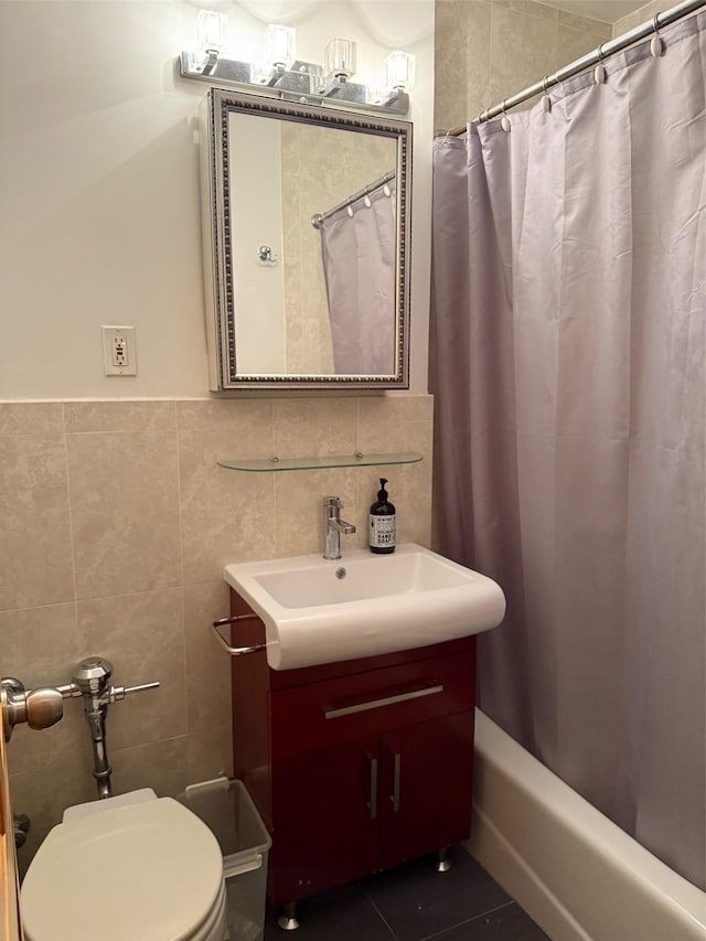100-25 Queens Blvd Unit 3D, Forest Hills, NY 11375 - bathroom with vanity, tile walls, shower / tub combo, and tile patterned flooring