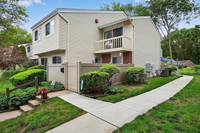 216UNITM Springmeadow Dr, Holbrook, NY 11741 - view of front of property with brick siding and a balcony