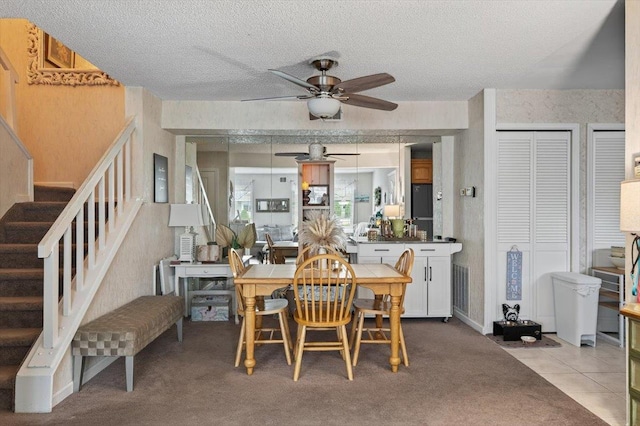 216UNITM Springmeadow Dr, Holbrook, NY 11741 - dining space with a ceiling fan, stairway, and a textured ceiling