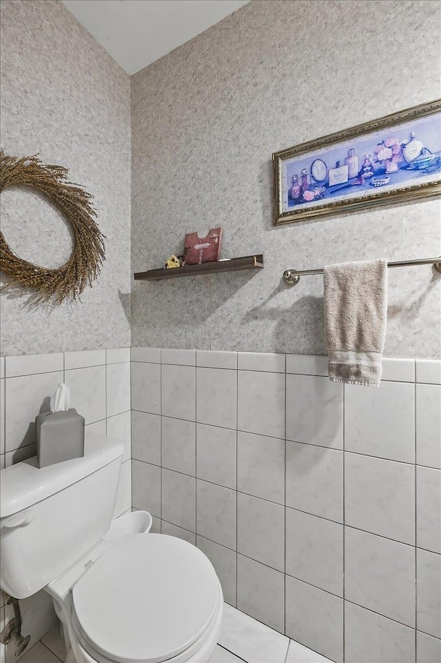 216UNITM Springmeadow Dr, Holbrook, NY 11741 - half bath with tile walls and tile patterned flooring