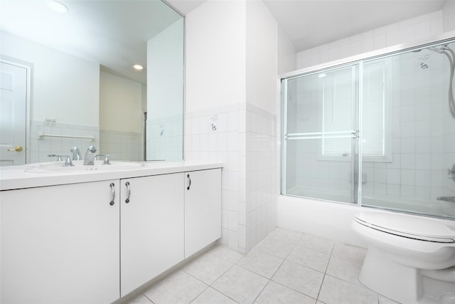 18 Sutton Ter, Jericho, NY 11753 - bathroom featuring tile walls, vanity, tile patterned flooring, shower / bath combination with glass door, and recessed lighting