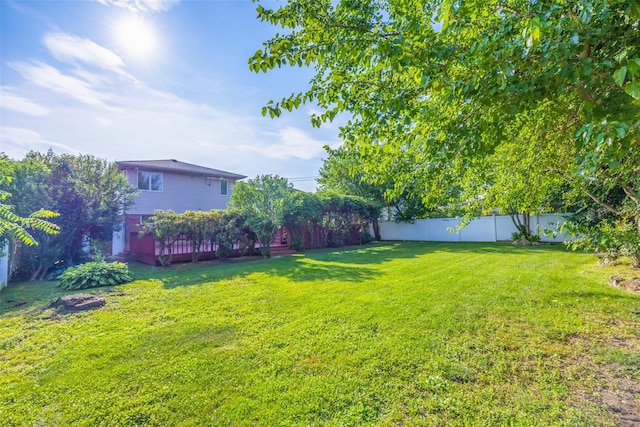 18 Sutton Ter, Jericho, NY 11753 - fenced backyard featuring a wooden deck