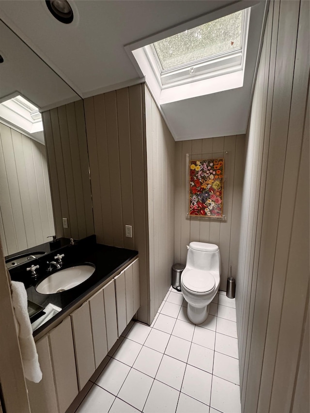 487 Tarpon Walk, Fire Island Pines, NY 11782 - bathroom with a skylight, tile patterned flooring, and vanity