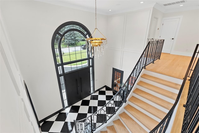 2 Maple Way, Woodbury, NY 11797 - entrance foyer featuring a chandelier, a high ceiling, recessed lighting, and crown molding