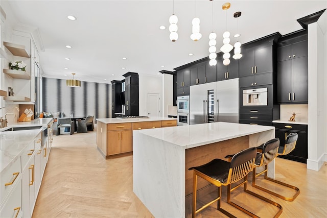2 Maple Way, Woodbury, NY 11797 - kitchen with appliances with stainless steel finishes, dark cabinetry, a spacious island, open shelves, and recessed lighting