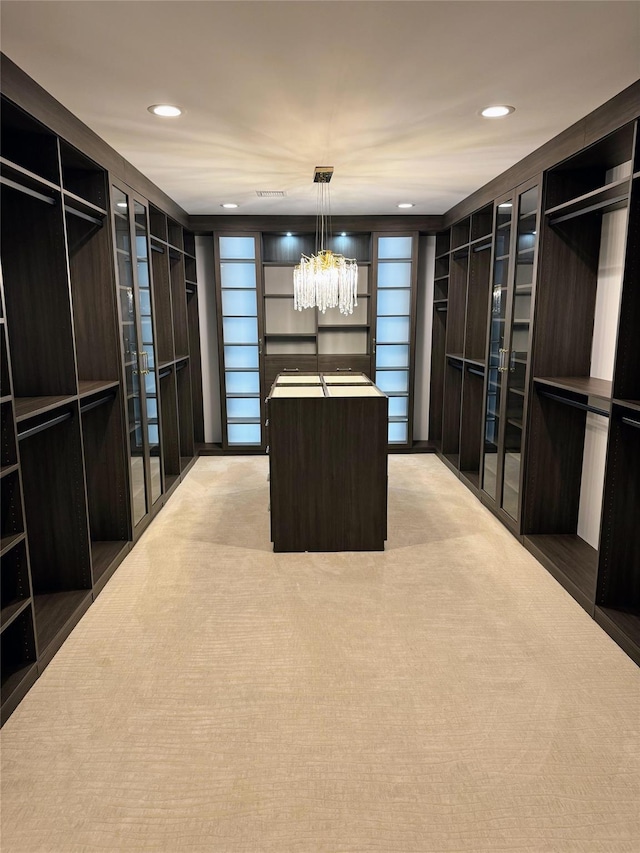 2 Maple Way, Woodbury, NY 11797 - spacious closet with light carpet and a chandelier