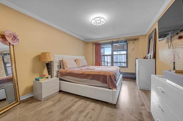 61-45 98th St Unit 11G, Rego Park, NY 11374 - bedroom featuring ornamental molding and light wood-style floors