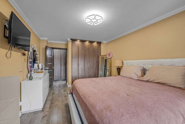 61-45 98th St Unit 11G, Rego Park, NY 11374 - bedroom featuring ornamental molding and hardwood / wood-style flooring