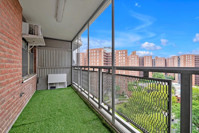 61-45 98th St Unit 11G, Rego Park, NY 11374 - unfurnished sunroom with a city view