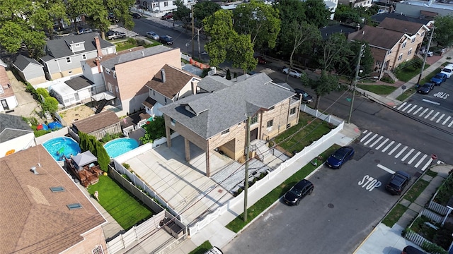 1604 Robertson Pl, Bronx, NY 10465 - aerial perspective of suburban area with a pool area