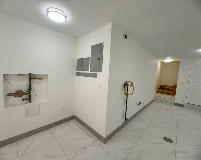 1604 Robertson Pl, Bronx, NY 10465 - hallway with light marble finish floors, electric panel, and stairway