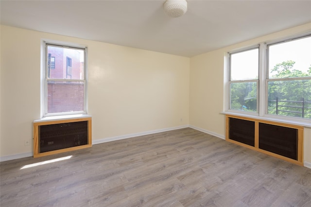 610 Waring Ave Unit 5F, Bronx, NY 10467 - unfurnished room with wood finished floors and baseboards