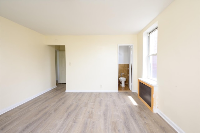610 Waring Ave Unit 5F, Bronx, NY 10467 - unfurnished living room with light wood-type flooring