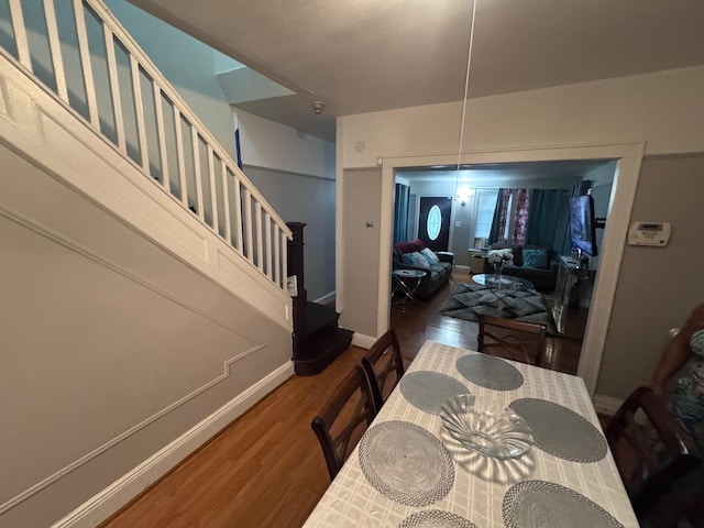 1492 E 45th St, Brooklyn, NY 11234 - dining area with stairs and wood finished floors