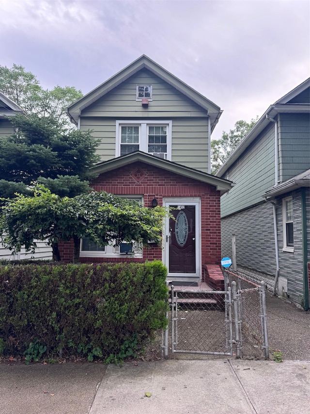 1492 E 45th St, Brooklyn, NY 11234 - view of front of home with a gate and brick siding