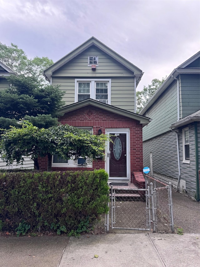 1492 E 45th St, Brooklyn, NY 11234 - view of front of property featuring a gate and brick siding