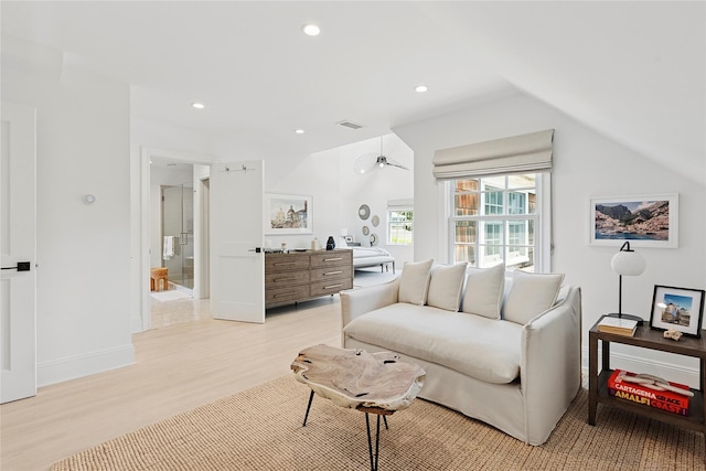 63 Armande St, Southampton, NY 11968 - living area with light wood finished floors, lofted ceiling, and recessed lighting