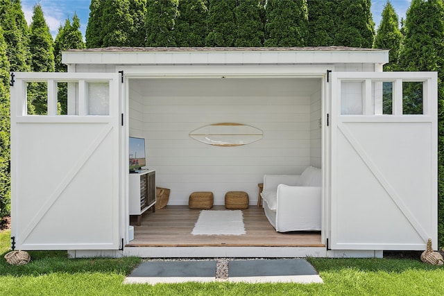 63 Armande St, Southampton, NY 11968 - view of outdoor structure with view of scattered trees
