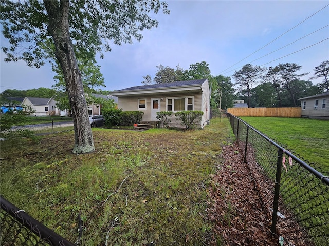 83 Priscilla Ave, Riverhead, NY 11901 - bungalow-style house featuring a fenced backyard